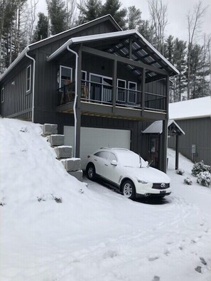 Snow-covered cottage.  SNOW, one of the best times to experience the mountains.