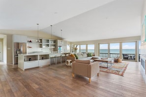 Open plan kitchen & living room, with amazing panoramic view of Lake Michigan.