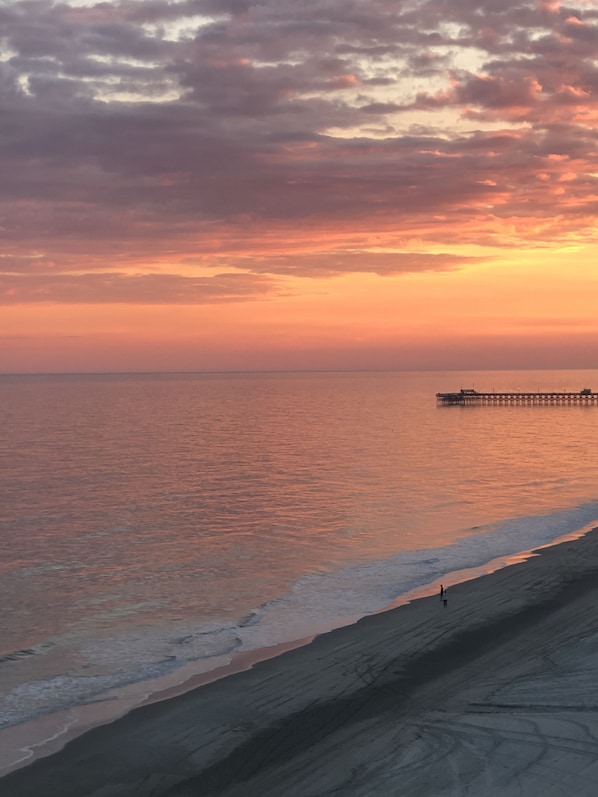 Balcony view looking towards sunset over Apache Pier