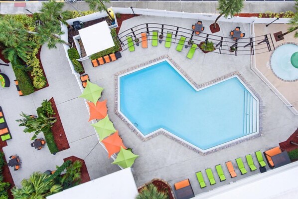 Swimming pool and poolside loungers