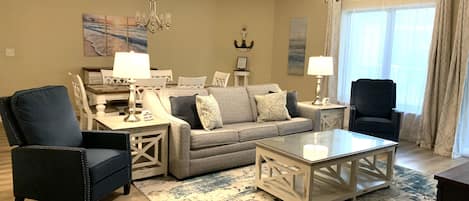 Living room has queen sleeper sofa and 50” tv with Spectrum Cable Gold package!