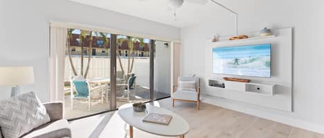 Relax in style, stream your favorites, or slide open the door to sunshine with easy patio access!