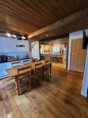 View of the dining area and kitchen.