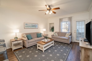 Living Room with Sunroom Access, Cable TV/DVD, and Sofa Bed