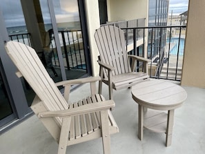 Two Adirondack chairs and table provides another dining area...