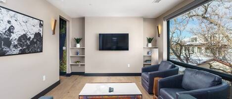 Living Room w/ Cable TV & Sleeper Sofa