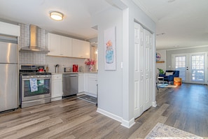 View of the kitchen and living room from the front door