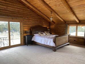 Loft bedroom with king bed. 