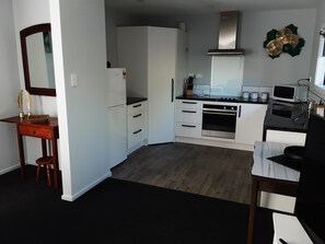 Open plan kitchen/dining and lounge. East facing gets all the evening sun.