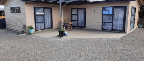 Private courtyard, has a keygola shading for hot days or wet weather.