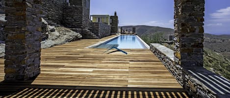 Large deck area with a 25 meters long swimming pool