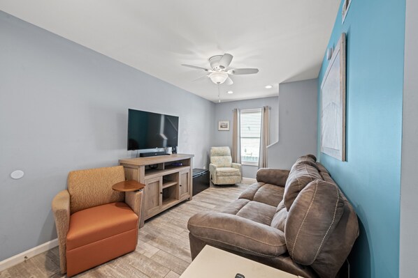 Perfect room for friends and family to gather around for movie night.