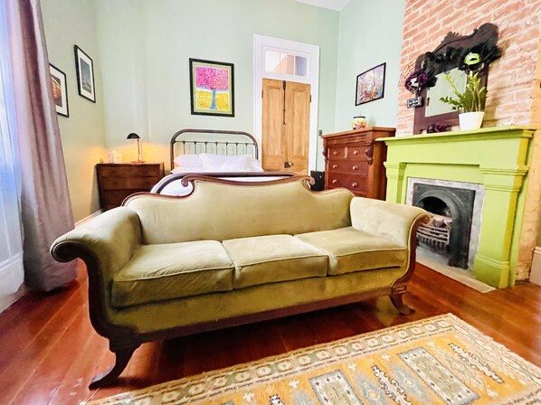 Bedroom 1: With tv, chair/desk, mini-fridge, private bathroom.