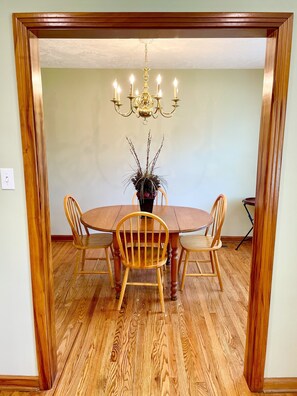 Dining table with room for 4 guests. 2 additional chairs for extra guests.