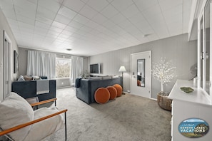 Living room in Fire suite with connecting door to Earth suite