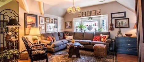 Spacious second floor living room featuring smart TV with cable