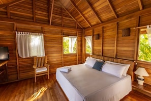 In the Master suite, experience divine relaxation on a heavenly comfort bed, surrounded by gently flowing curtains that allow the refreshing breeze and pure sunlight to enter. The backdrop of the lush jungle and mesmerizing ocean views further enhances the serene atmosphere.