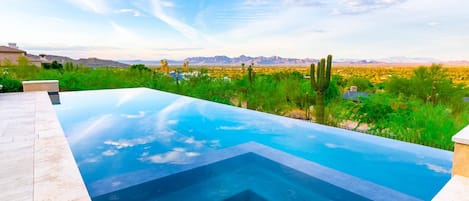 Gorgeous large infinity pool w/ built in spa & immaculate desert views