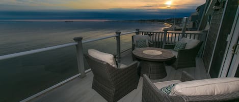 Third level patio, off of bedroom with queen bed and twin bed with trundle.