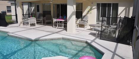 Large beautiful pool and spa with covered lanai and plenty of seating for all.