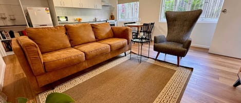 Three seater leather lounge in living area