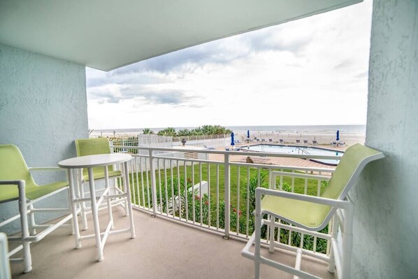 Private Balcony overlooking the beach & pool