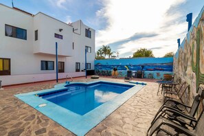 Backyard pool & patio has gas barbecue and kitchen available for all our guests.