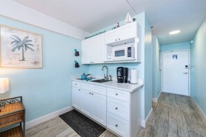 Kitchenette with upscale quartz counters and everything you need for your vacay