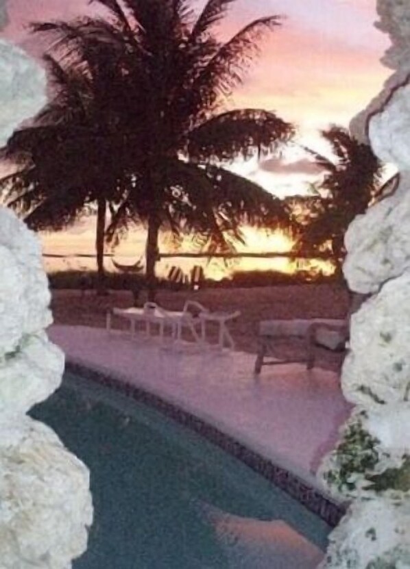 Tiki Beach view at sunrise from the hot tub grotto