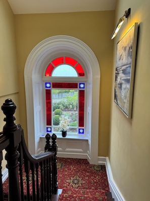 Stained window for 1880. We have the original drawing hanging in the Study