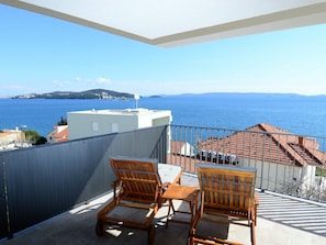 Sky, Water, Daytime, Building, Property, Table, Azure, Shade, Seaside Resort, Interior Design
