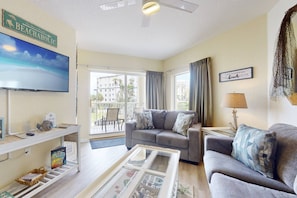 Comfortable Living Room w/ Large Flat Screen TV, And Plenty Of Seating