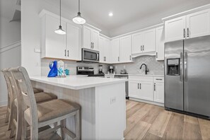 Breakfast bar and kitchen