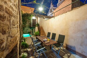 Interior patio with pool and furniture