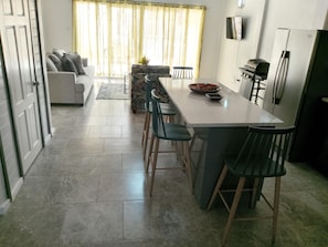 Your kitchen island where you can both prepare and serve a meal.