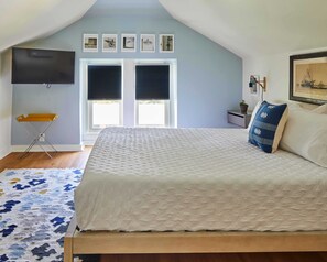 Step into the master bedroom. With a perfectly balanced, memory foam bed and supple sheets, you'll sleep well in this California king.