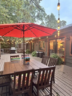 Outdoor dining area with lighting