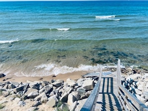 Lake Michigan Beach, accessed via shared deck/steps (photo taken September 2024)