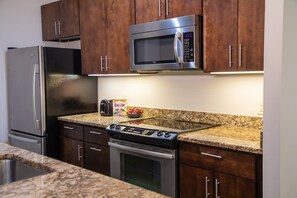 Prepare a meal in the equipped kitchen.