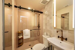 Each bathroom is equip with it’s own hair dryer.