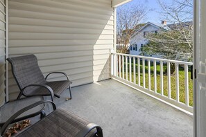 Balcony off breakfast room; trees are full leaves in the summer