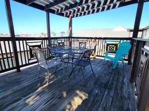 The large, private deck offers view of Port Aransas.