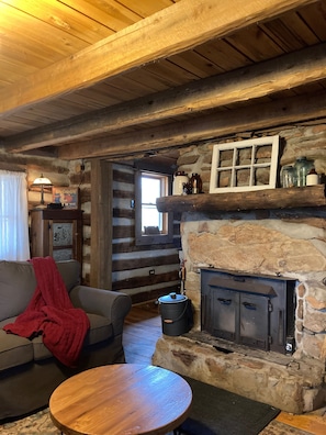 The fireplace/woodstove is the heart of of our cabin.