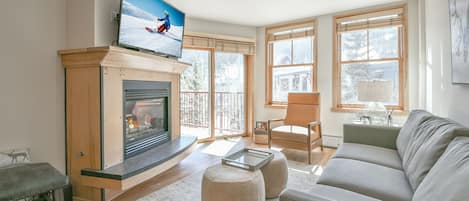 Nicely decorated living area with access to a private balcony