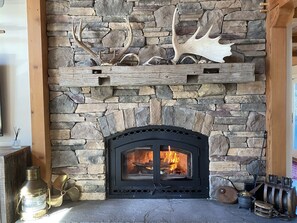 Fireplace, with bluestone hearth & old barn mantel.