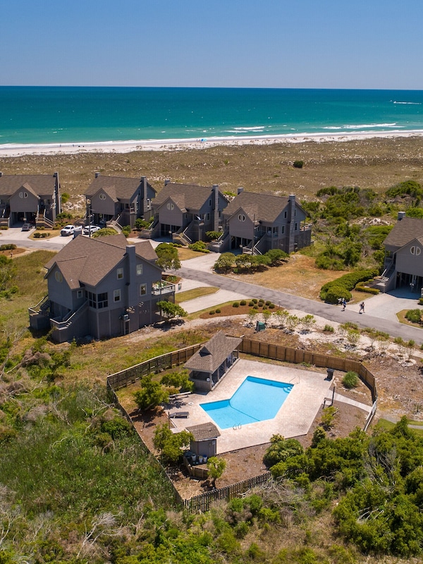 Home is across from pool (unit on far right).