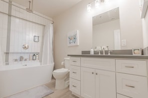 large modern bathroom with soaking tub