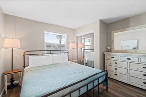 King Master Bedroom offers ultimate comfort with a smart TV and provided linens for a restful stay!