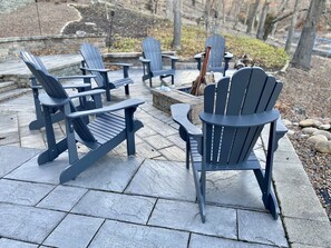 Lake level patio with fire pit & firewood. 