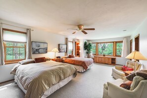 Primary bedroom with 2 queen beds and large walk in closet
